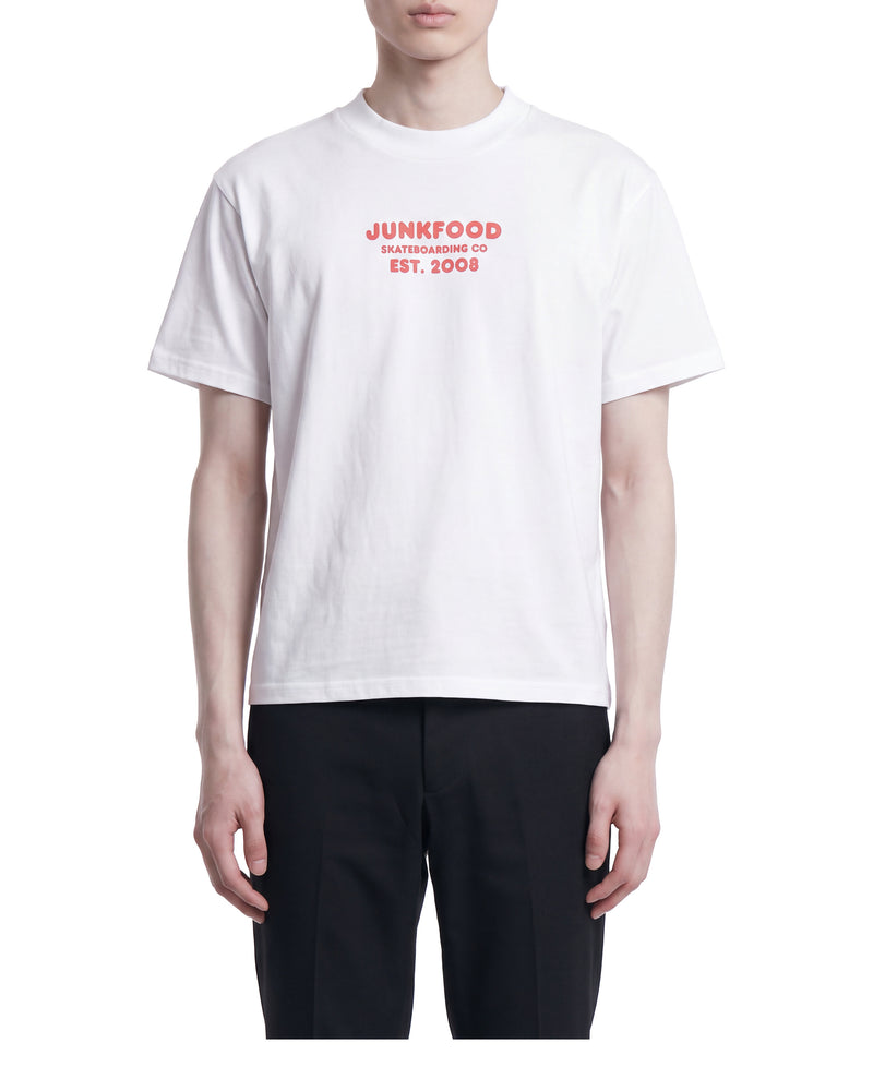 Junkfood Skateboarding Co tee, red chest print, on a model, front view