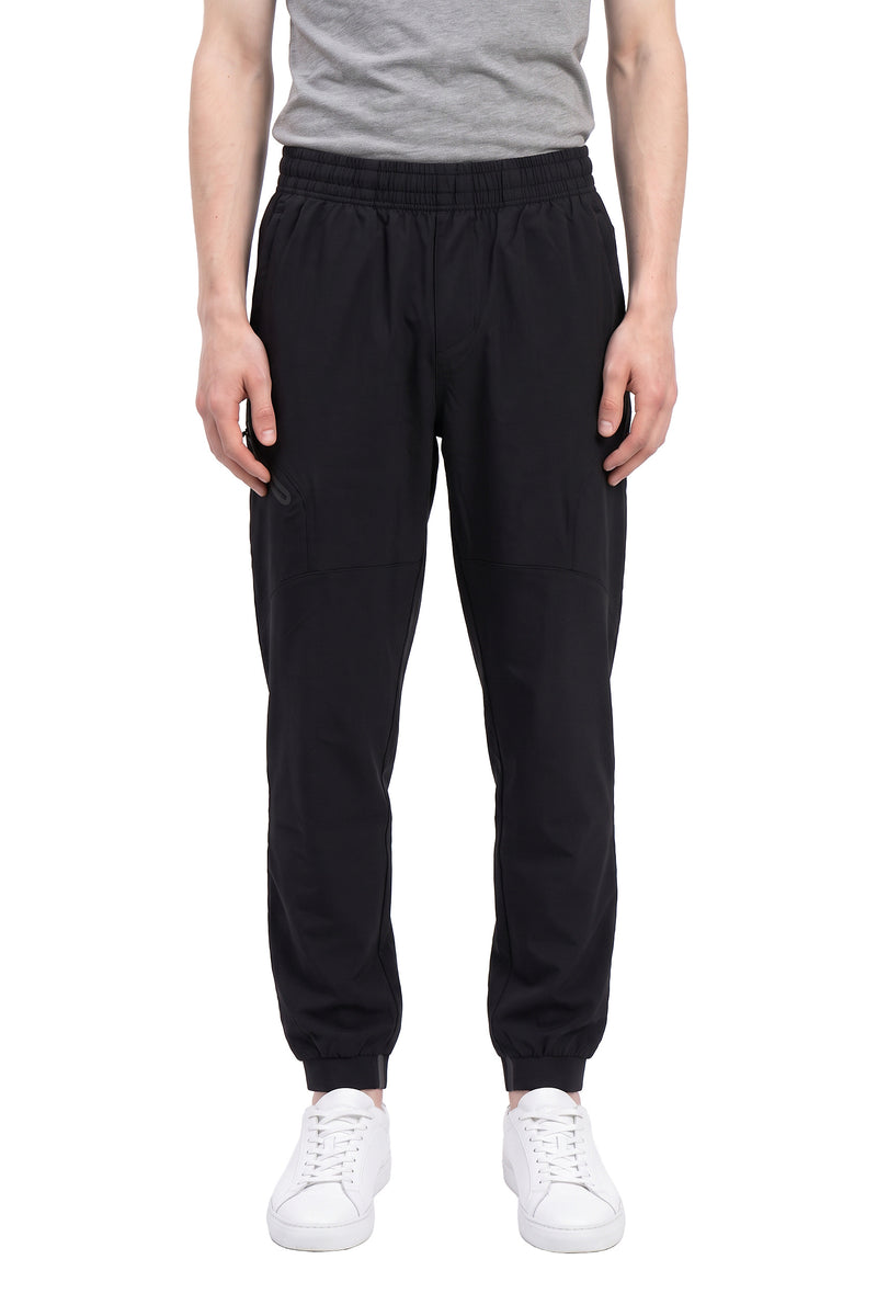 Under Armour Unstoppable woven jogger, on a model, front view