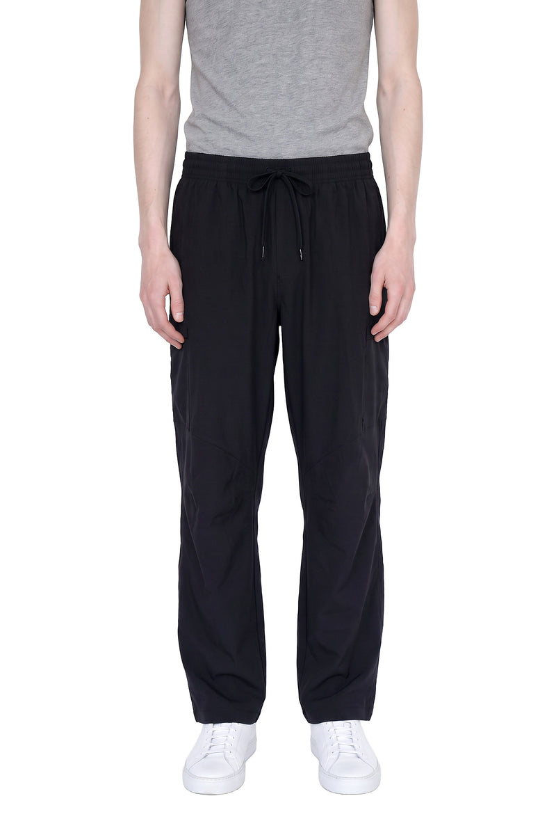 Under Armour stretch woven pants, on a model, front view